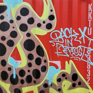 Close-up detail of Remio's fast action throwback style bombing art